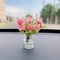 Pink faux flower bouquet in clear glass bottle car ornament on dashboard - Pink Flower
