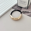 Elastic hair tie with a gold curved metal crescent charm and black high-stretch cord - Style O KC Gold