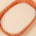 Close-up of baby fitted sheet with brown hearts on a soft cotton cradle mattress - Heart Print / 81*41 cm