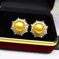 Elegant 8-9mm golden pearl sunflower earrings with sparkling T-shaped diamonds on red velvet - Gold Pearl Gold Base
