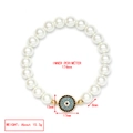 Detailansicht Perlenarmband mit Evil Eye und Maßangaben 174mm sowie 15,3g Gewicht - Runder Böser Blick (LE19GD04)