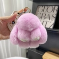 Detail of soft pink plush rabbit keychain with a premium golden metallic clasp - 10cm Bunny / Taro Purple