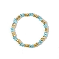 Handmade sky blue beaded ring with gold square accents on a clean white background - Clear Blue and Gold