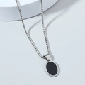 Hip hop style silver chain with oval black gemstone pendant on minimalist white background - Single Layer Oval