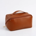 Large brown PU leather pillow makeup bag with top handle and gold zipper closure - Mocha