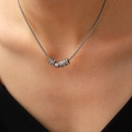Silver necklace featuring five cylindrical charms with white zircons and polished finish - Stainless Steel Necklace (Zirconia Five Rings) (G-498) / Silver