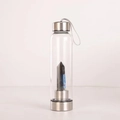 Glass water bottle with silver lids and blue crystal pillar prism inside for energy healing - Labradorite Bottle