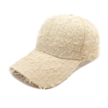 Vista dettagliata del bordo a taglio vivo e della trama a frange sul cappello beige - M (56-58cm) / Cachi
