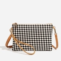 Black and white checkered woven crossbody bag with tan leather strap and gold hardware - Black