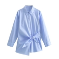Light blue poplin shirt featuring a waist bow tie and asymmetrical hem in a flat lay view - XS / Light Blue