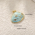 Detailed view of light blue enamel seashell pendant with gold edges and dimensions - A0577 Light Blue Shell with Zirconia