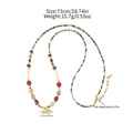 Sautoir tissé à la main avec perles colorées et un pendentif éléphant doré élégant - Chaîne de Pull Longue en Pin Africain (73+5cm)