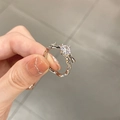 Irregular fluid silver ring featuring a round clear center stone and pave accents - Adjustable Open / Irregular Fluid Diamond Style (J3151)