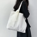 Close-up of canvas tote bag with black polka dots and delicate lace bow details - White Background Black Polka Dots (With Lace Ribbon)