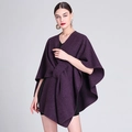 Fashionable purple knitted poncho shawl with twist detail and elegant drape for women - One Size / Purple