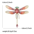 Golden dragonfly brooch with pink enamel wings and large red gemstone center - Gold Pink