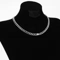 Silver Cuban link necklace featuring a central clear zircon on a black neck display - Silver Necklace (D791)