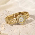 Close-up of gold stainless steel watch bracelet with rhinestones on stone and silk - Roman Numerals Style