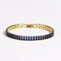 Elegant gold bracelet featuring rectangular dark blue zircons in a classic claw setting - Gold Blue Zircon