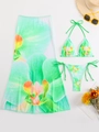 Detail of three-piece green floral bikini set with matching mesh sarong for summer beach - Green 3-Piece Set