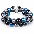 Detail of beaded bracelet with blue cat eye stones, metal beads and Om symbol - Blue Tiger Eye Bracelet