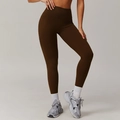 Leggings yoga a vita alta marrone scuro con tasche laterali e vestibilità a compressione - M / Marrone Tè di Betulla
