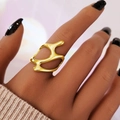 Futuristic liquid metal style ring with irregular hollow design in polished gold finish - US 7 / Gold