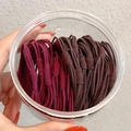 Elastic hair ties in burgundy and dark brown colors stored in a clear container - 20 PCS (OPP Bag) / Wine Red + Coffee
