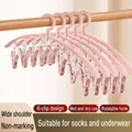 Pink multi-functional plastic hanger with wide non-slip shoulders and 6 clips for socks - Pink