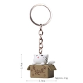 3D cartoon white cat sitting in a brown box plastic keychain with silver ring - Keychain / Take Me Away Red-Mouth White Cat