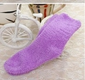 Purple fluffy coral fleece crew sock for men displayed on a decorative bike model - Purple