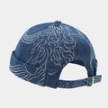 Detail of blue denim docker hat featuring white embroidery and adjustable metal back strap - Dark Blue Abstract Flame Print Style (Color No. 5)