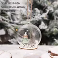 LED glass Christmas ball ornament with a miniature girl and snow-covered tree - HG18-626 (Girl)
