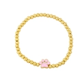 Beaded gold bracelet with a cute pink enamel paw print charm for girls and women - Pink