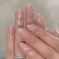 Short almond press-on nails with pink jelly base, silver glitter gradient and rhinestones - Bz1439 Starlight Shines / Glue Type