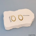 Macro view of gold hoop earrings showing 3cm length and 4.89g weight details - Flat Oval Gold 3cm