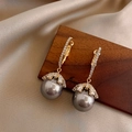 Macro detail of luxury gray pearl drop earrings with sparkling zircon on silk background - Glossy Gray