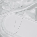 Detailed view of an S925 sterling silver ball chain necklace on a decorative white tray - Silver Bead Chain (45CM)