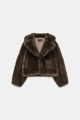 Detail shot of a dark brown faux fur coat showing soft texture and wide lapels - XS / Coffee