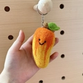 Handmade orange wool felt carrot keychain with cute smiley face and metal ring - Yellow Carrot