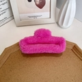 Plush large claw clip for hair in vibrant rose pink color with soft faux fur texture - Rose Red