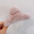 Plush faux fur claw clip in soft pink for elegant hair styling and bun accessories - Lotus root pink