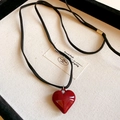 Cute red heart pendant necklace with black cord strap on a jewelry display tray - 14# Adjustable Leather Resin Heart Necklace
