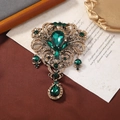Vintage Baroque emerald and gold hollow brooch with pendant teardrop gemstones - Style 1 (Emerald Green + Antique Gold)