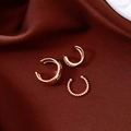 Close-up detail of 18k gold plated ear cuff set with twisted and zircon stone designs - Ear Cuff (3-Piece Set) / Gold