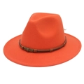 Detail of orange fedora wool hat featuring a brown braided band and skull metal buckle - Orange