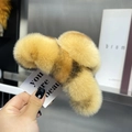 Detail of a large leopard print plush hair claw clip in warm yellow faux rex rabbit fur - Extra Large / Khaki Leopard