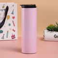 Pink stainless steel insulated travel coffee mug with black lid in a cozy gift setting - 500ml / Pink