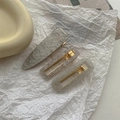 Close-up of marble pattern and glitter hair clips with gold metal base for styling - Grey Hair Clip 3Pcs Set