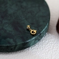 Minimalist gold-plated letter Q pendant with polished finish on marble surface - Letter Pendant (Q) / Gold